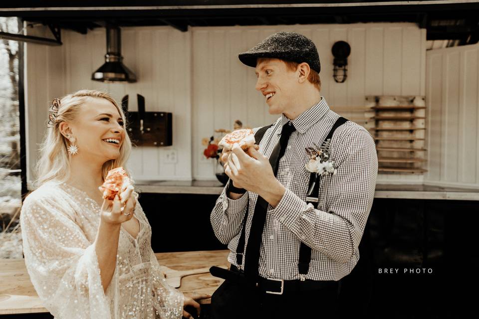 Couple eating pizza