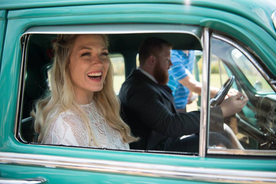 Newlyweds in the car | captured by www.bekkahcarterphotography.com