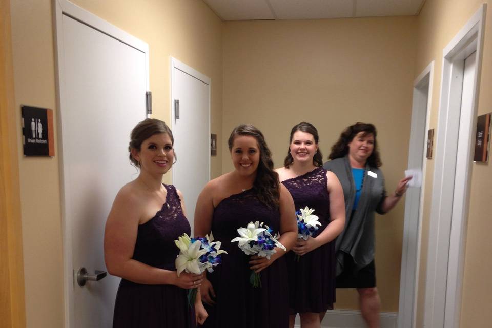 Bridesmaids ready for the ceremony.  Colors for the wedding were plum and teal blue.