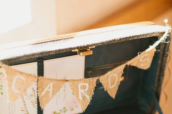Photo by Lucid Captures.
Vintage suitcase used as a card box