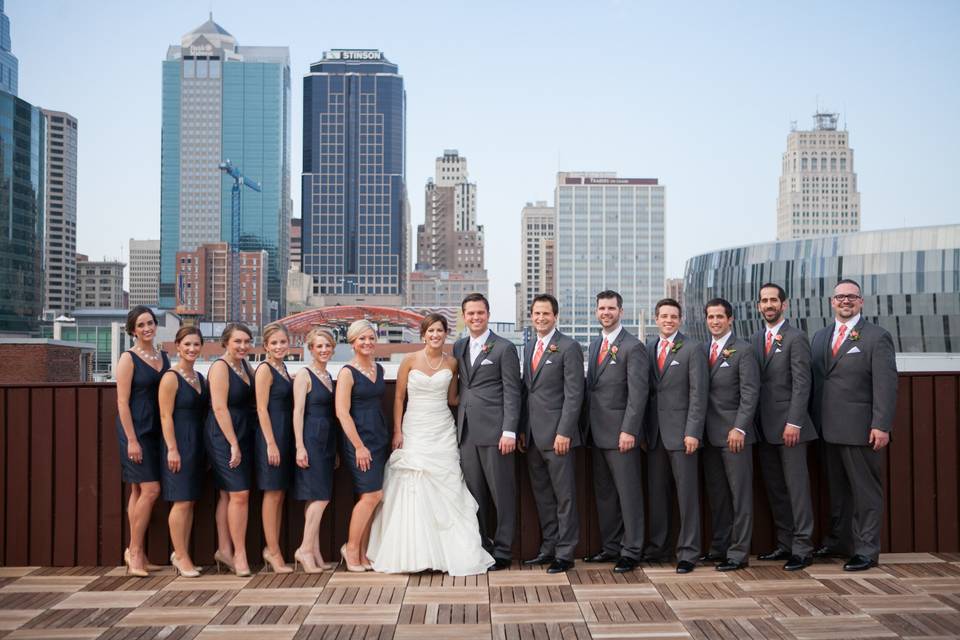 The couple with bridesmaids and groomsmen