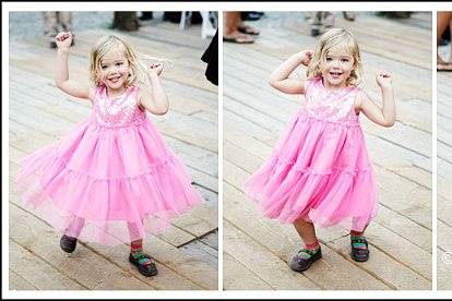 Little girl dancing at an outdoor wedding at Piney River Ranch in Vail, CO
