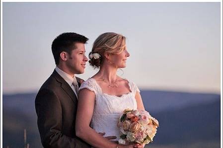 A bride and groom enjoy the sunset at Bella Vista Estate in Steamboat Springs, CO