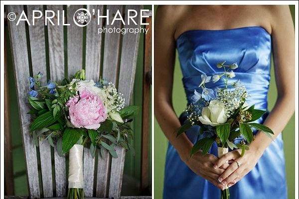 Bridesmaid wearing a light blue periwinkle satin dress and holds her bouquet at the 63rd St. Farm in Boulder CO