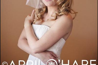 Bride poses for the camera in her dresssing room at Hudson Gardens in Littleton, CO