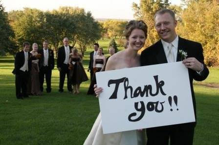 The couple together with their bridesmaids and groomsmen