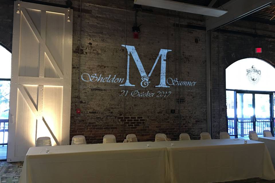 Monograms are beautiful. Especially on rustic Wilmington NC venue walls.