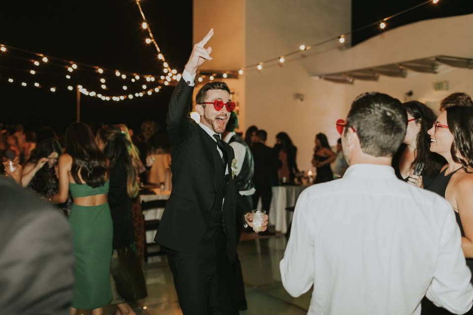 Groom dances at wedding