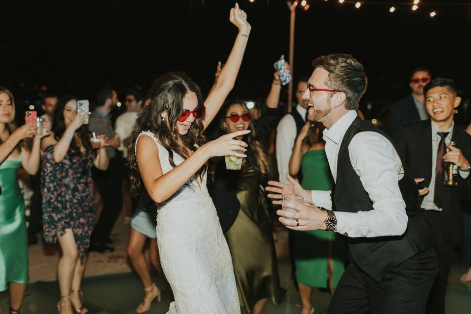 Bride and groom dance together