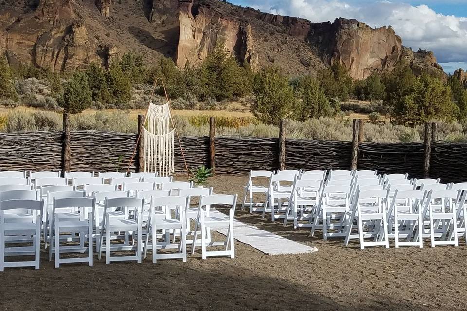 Formalize the outdoors with our white padded seat chairs.