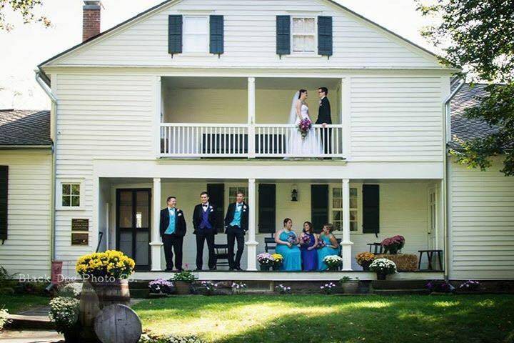 The couple with the bridesmaids and groomsmen