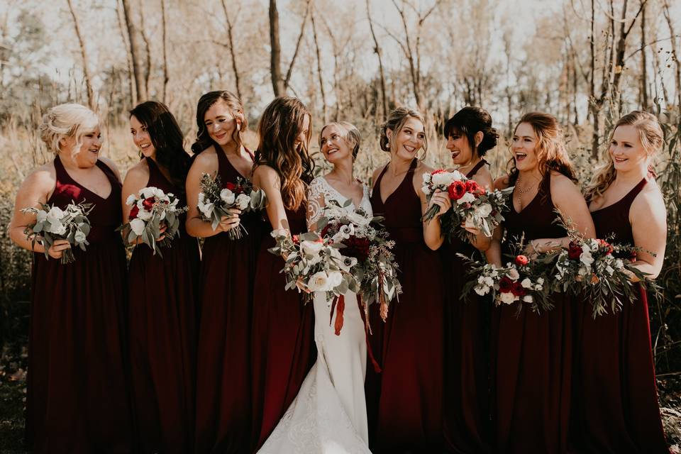 Bride, bridesmaids, and their bouquets