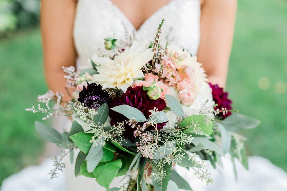 A bride and her bouquet.