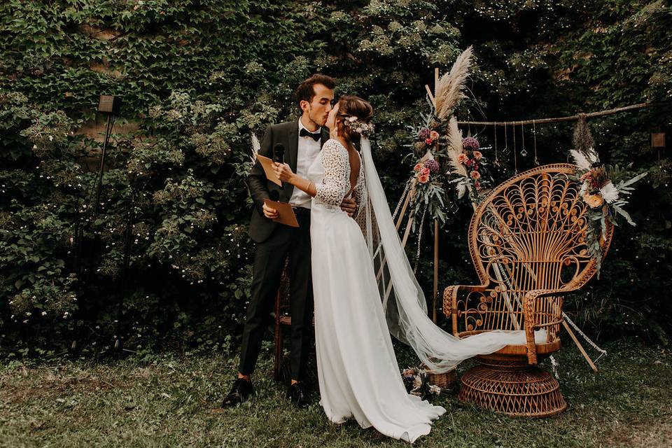 Groom kissing his bride