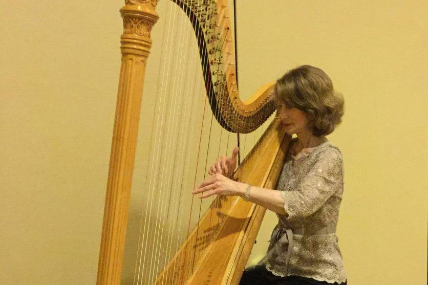 Playing the harp