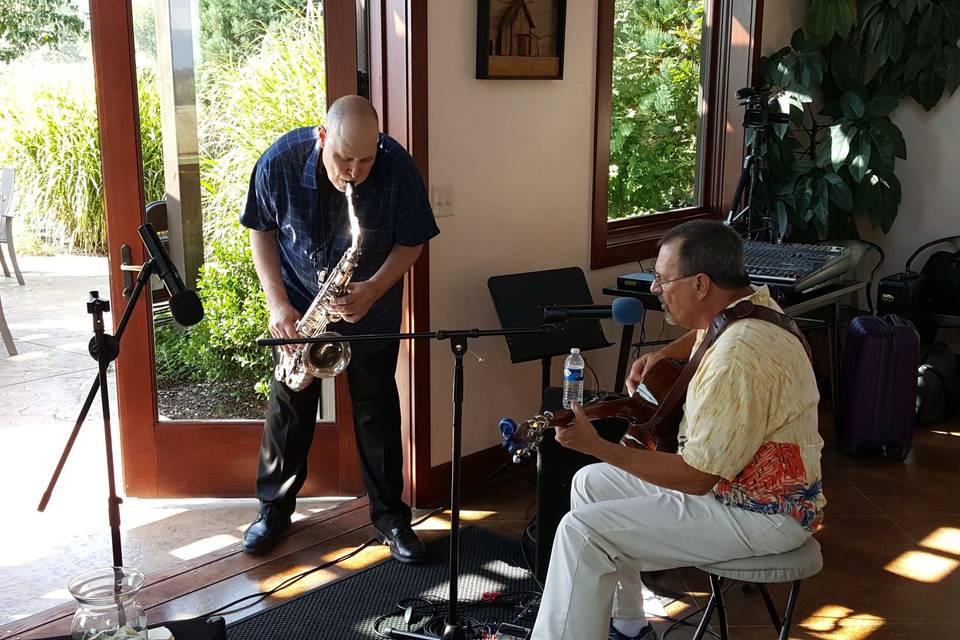 Another of my entertainers performing at a winery event in the tasting room of a local wineryThey are perfect for an intimate gathering or background music for a rehearsal dinner, etc.