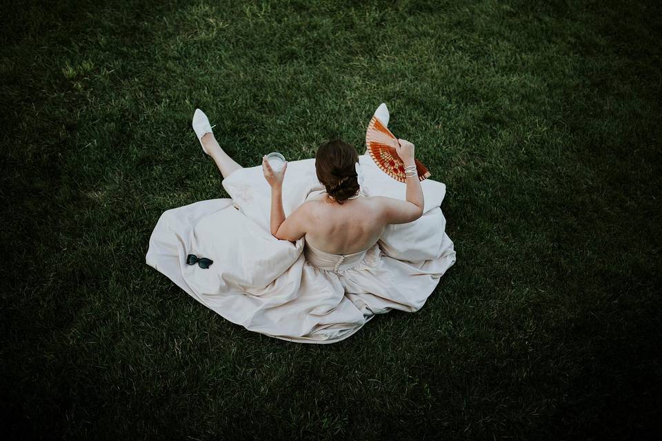 Bride cooling off at a summer wedding