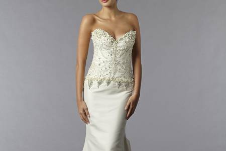Style 32698961  This mermaid gown features a sweetheart neckline with an asymmetric waist in satin and organza. It has a chapel train. This gown is Exclusive to Kleinfeld Bridal.