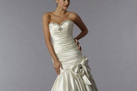 Style 32810764  This sheath gown features a sweetheart neckline with in silk faille and embroidery. It has a sweep train. This gown is Exclusive to Kleinfeld Bridal.