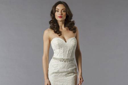 Style 32797490  This mermaid gown features a sweetheart neckline with a natural waist in lace and beaded embroidery. It has a chapel train. This gown is Exclusive to Kleinfeld Bridal.