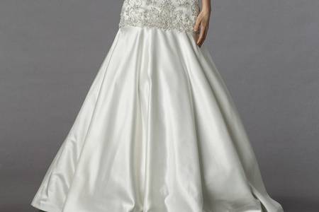 Style 33012030  This mermaid gown features a sweetheart neckline with a dropped waist in beaded embroidery and satin. It has a chapel train. This gown is Exclusive to Kleinfeld Bridal.