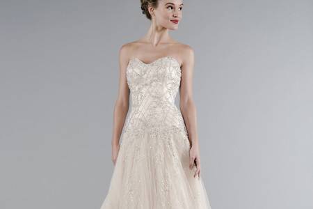 Style 32943698  This a-line gown features a sweetheart neckline with a dropped waist in tulle and beaded embroidery. It has a chapel train. This gown is Exclusive to Kleinfeld Bridal.