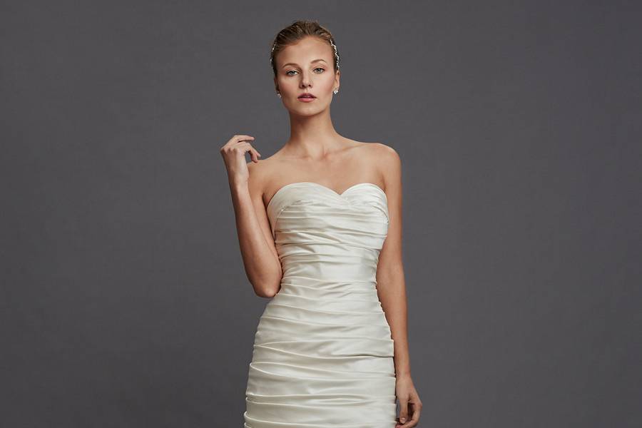 Style 32761553  This a-line gown features a strapless neckline with in satin. It has a chapel train. This gown is available in Plus Sizes, and is Exclusive to Kleinfeld Bridal.
