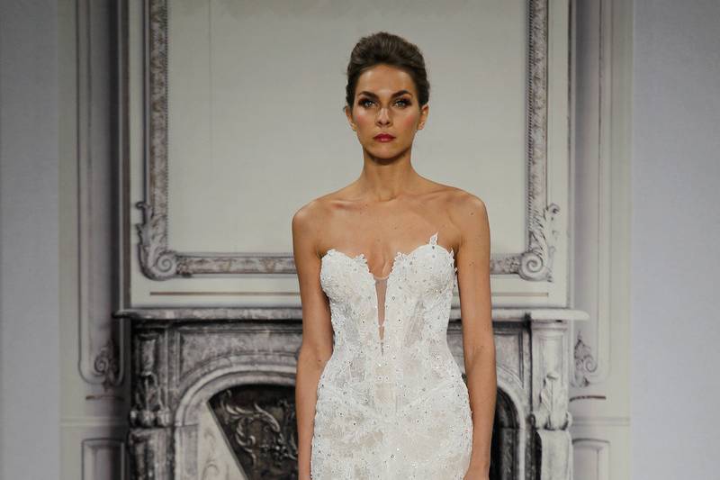 Style 33029380  This mermaid gown features a sweetheart neckline with a dropped waist in beaded lace. It has a chapel train. This gown is Exclusive to Kleinfeld Bridal.