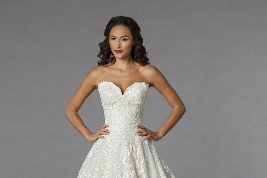 Style 32851685  This ball gown features a sweetheart neckline with a natural waist in lace and tulle. It has a chapel train. This gown is Exclusive to Kleinfeld Bridal.
