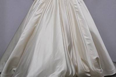Style 32445991 This ball gown features a sweetheart neckline with a natural waist in silk. It has a sweep train. This gown is Exclusive to Kleinfeld Bridal.