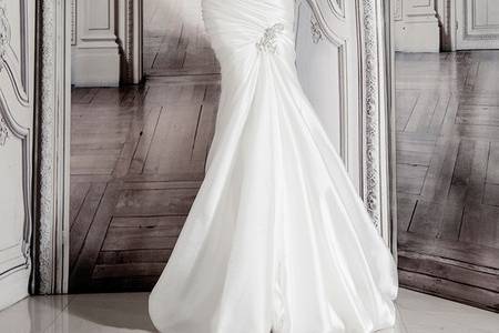 Style 32848178 This mermaid gown features a sweetheart neckline with a natural waist in lace. It has a chapel train and spaghetti straps. This gown is Exclusive to Kleinfeld Bridal.