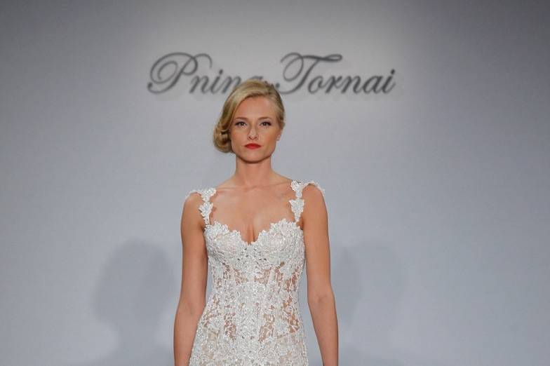 Style 4355Pearl and Swarovski beaded lace sheath with illusion bodice and front slit