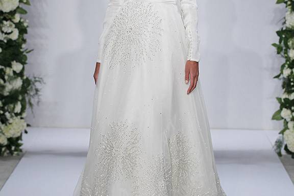 Style	Allure		Long Sleeve Nude Netting with white hand beaded symmetrical patterns on sheath gown with flounce at bottom