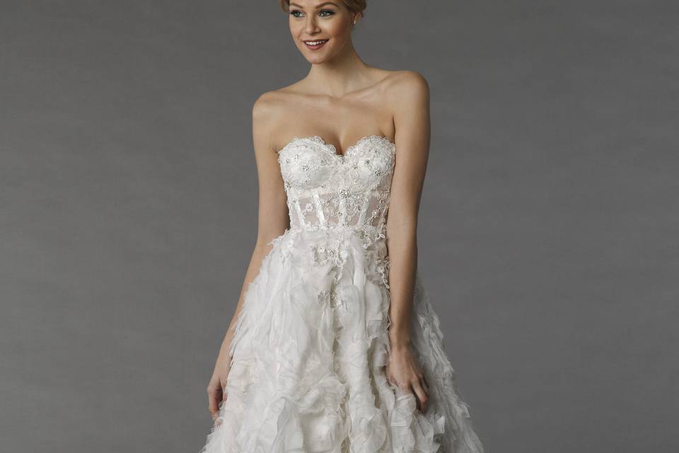 Pnina Tornai 14180		This a-line gown features a sweetheart neckline with a natural waist in lace. It has a chapel train and spaghetti straps. This gown is Exclusive to Kleinfeld Bridal.