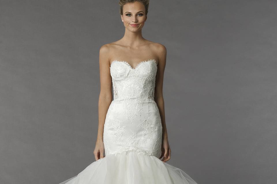 Pnina Tornai 4377	This mermaid gown features a sweetheart neckline with a natural waist in satin and tulle. It has a chapel train. This gown is Exclusive to Kleinfeld Bridal.