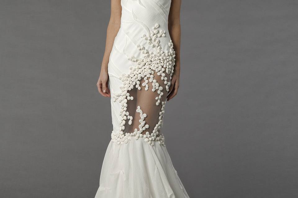 Tony Ward 6F14		This sheath gown features a bateau neckline with in chiffon and beaded embroidery. It has a chapel train and cap sleeves.
