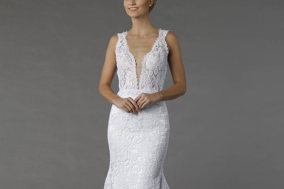 Style	4372		This sheath gown features a v-neck neckline with a natural waist in lace. It has a chapel train and a tank top. This gown is Exclusive to Kleinfeld Bridal.