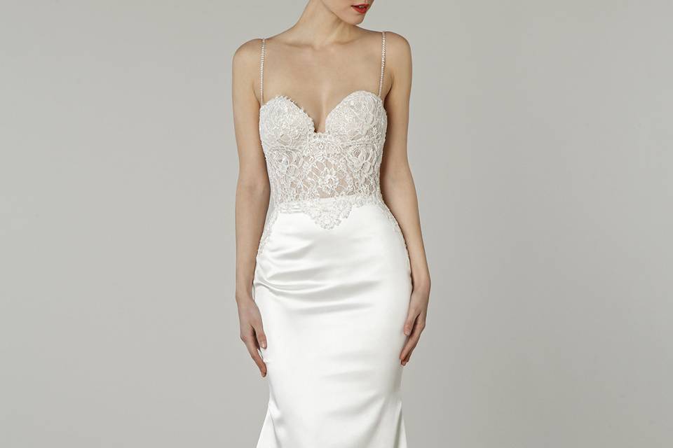 Pnina Tornai for Kleinfeld 	4377		Ivory satin gown with sweetheart neckline and beaded embroidery.