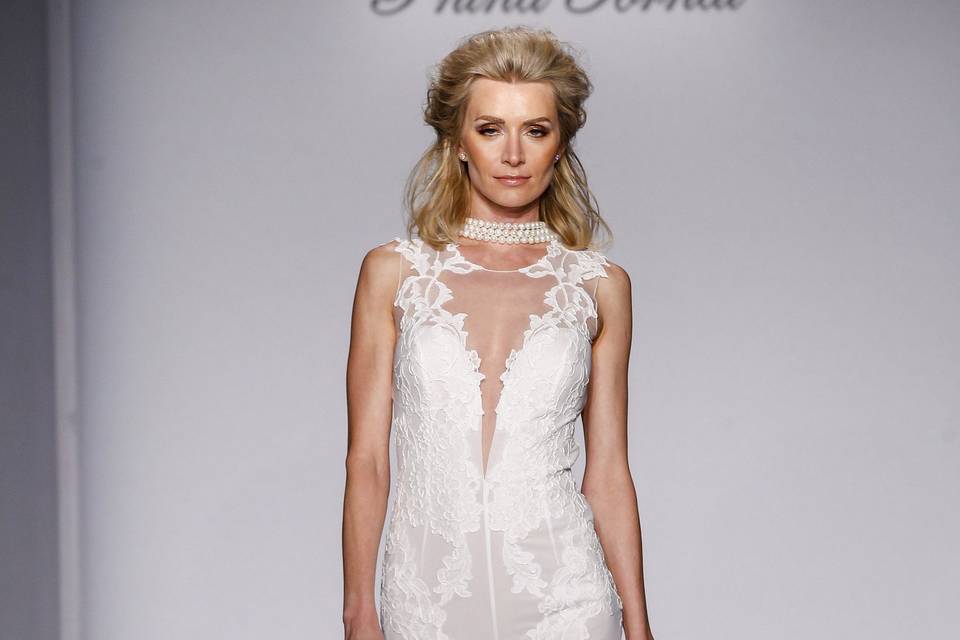 Style	4453	 Ivory silk chiffon jumpsuit with lace appliques and illusion back.