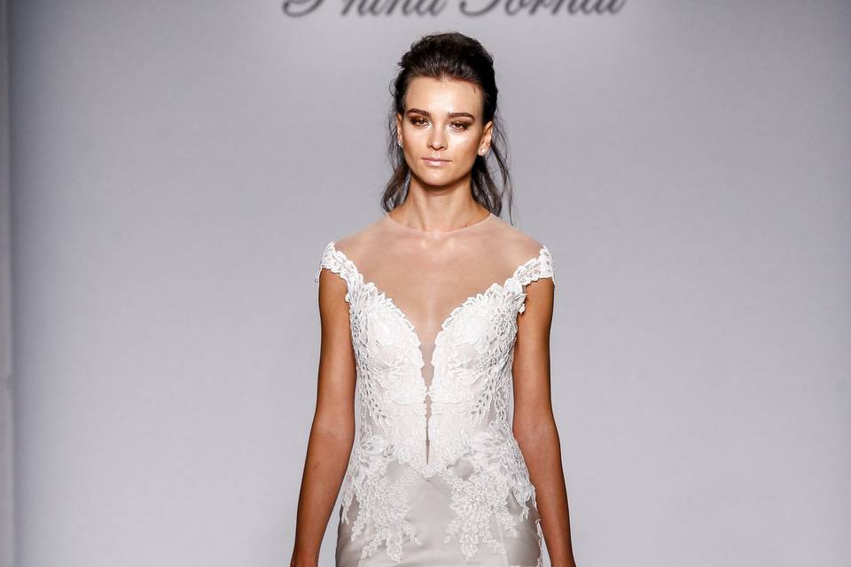 Pnina Tornai Style 4466  Ivory off-the-shoulder silk organza trumpet with lace appliques and bow on corset back.