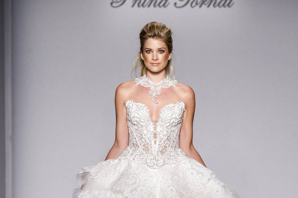 Pnina Tornai Style 4443  Ivory satin organza ball gown with natural waist, cap sleeves, lace appliques and lace bow on back.