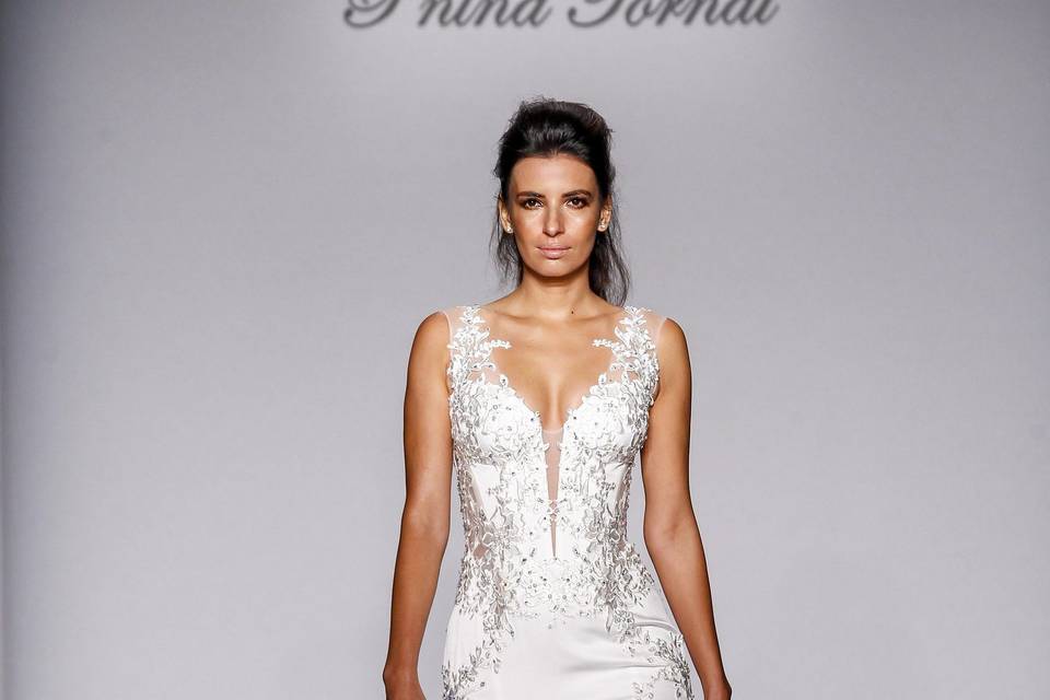 Pnina Tornai Style 4466  Ivory off-the-shoulder silk organza trumpet with lace appliques and bow on corset back.