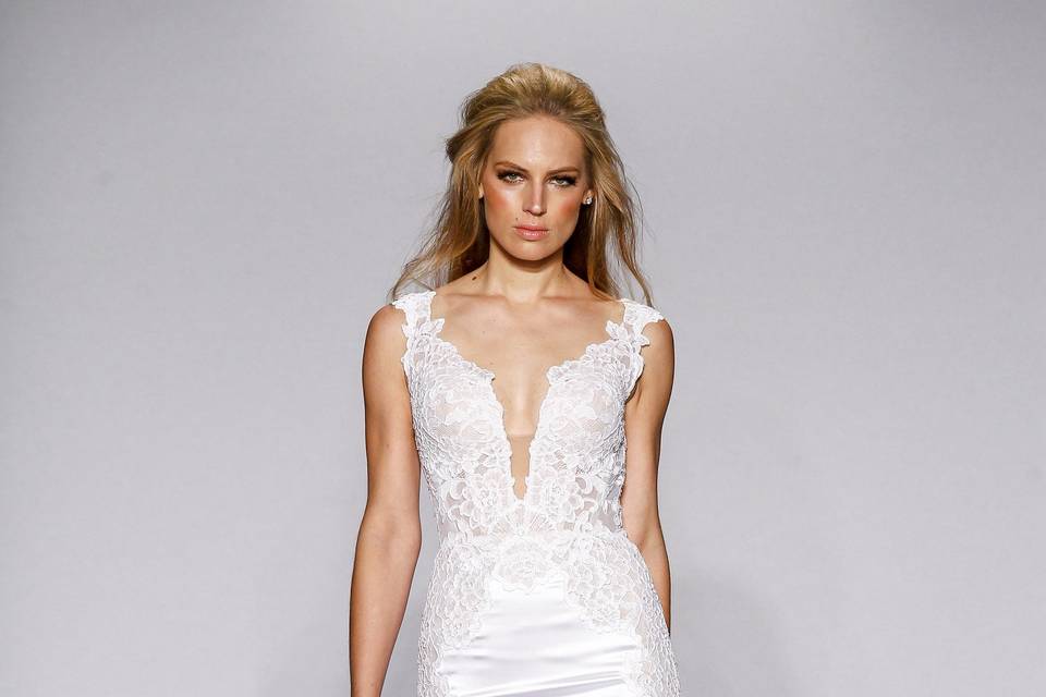 Pnina Tornai Style 4437  Ivory satin mermaid with deep v-neck, low back and lace appliques on bodice and hem.