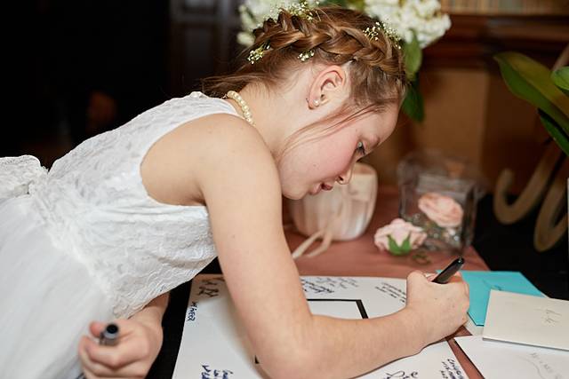 Signing the book