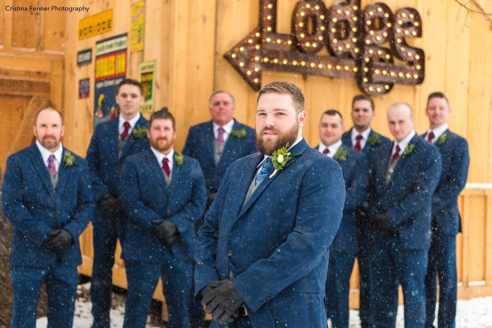 Groomsmen stand by exterior