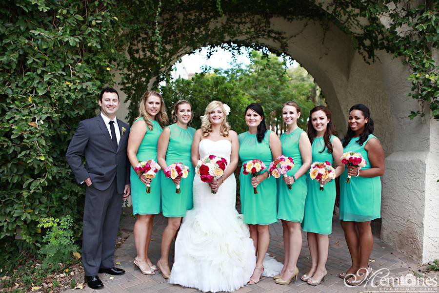 The couple with the bridesmaids