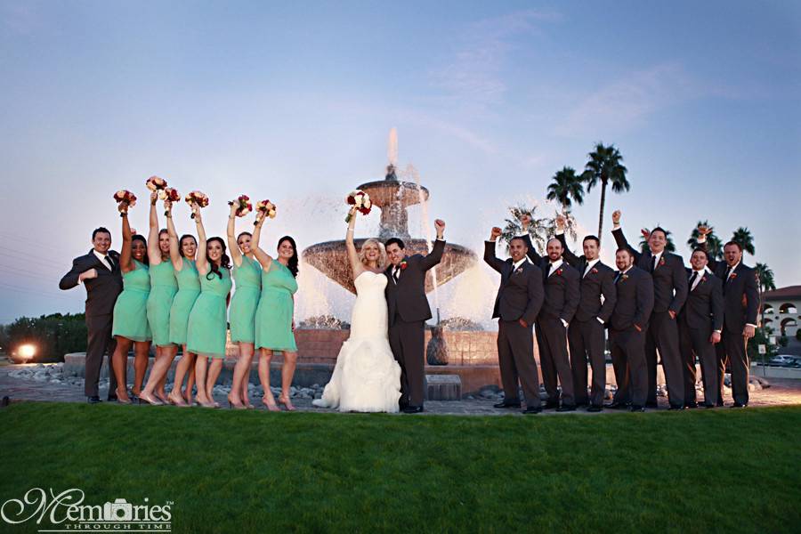 The couple with the bridesmaids and groomsmen