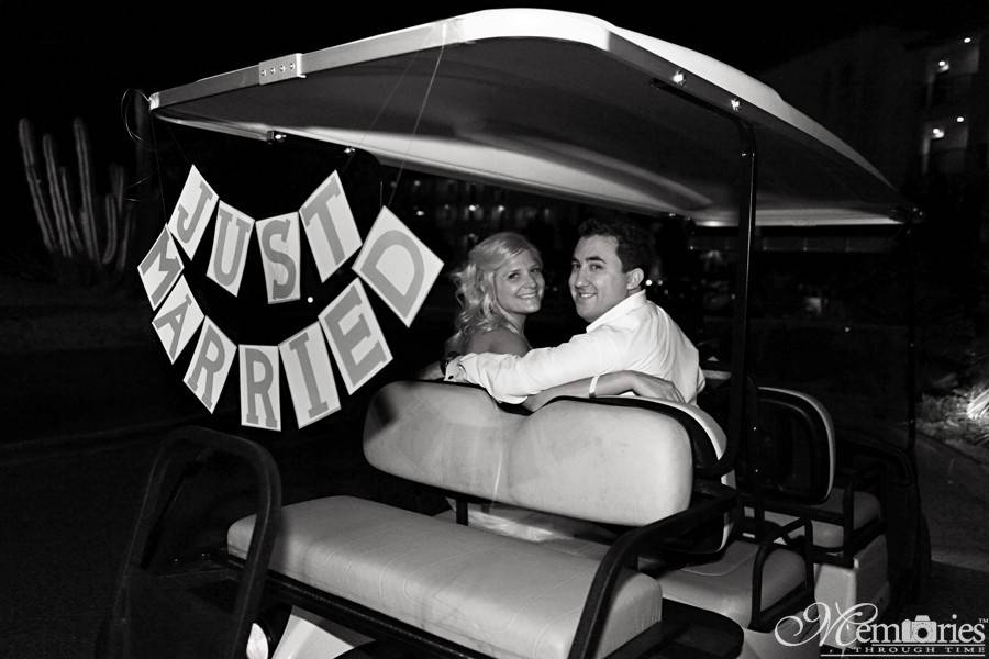 The couple at their bridal car