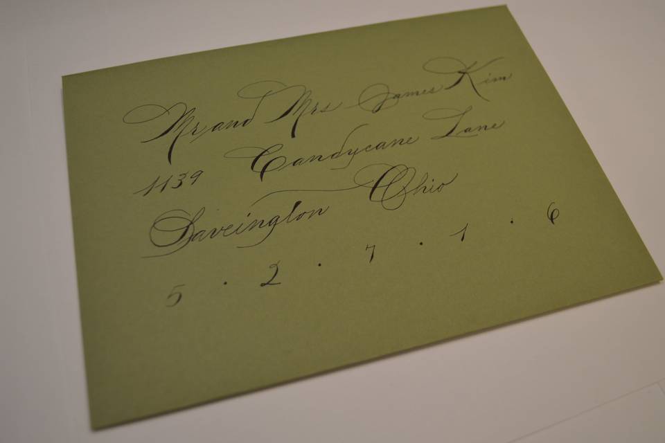 Green addressed envelope