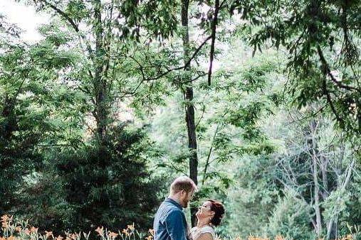 Newlyweds by the woods